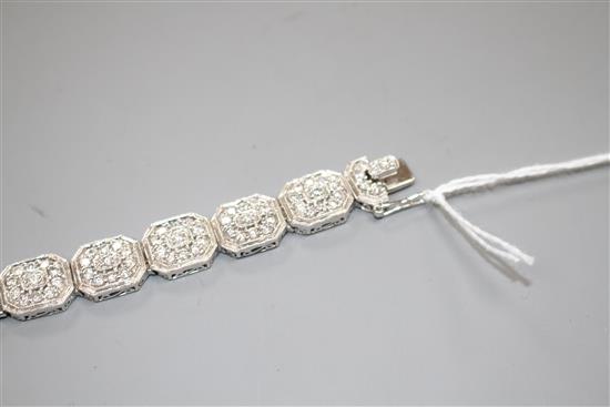 A modern 14k white metal and diamond encrusted octagonal link bracelet, 18.3cm, gross weight, 35.8 grams.